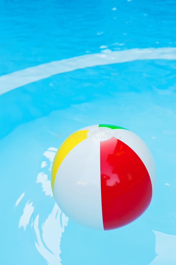 Beach Ball Floating in the Pool Stock Photo Image of swimming, colored 5377058