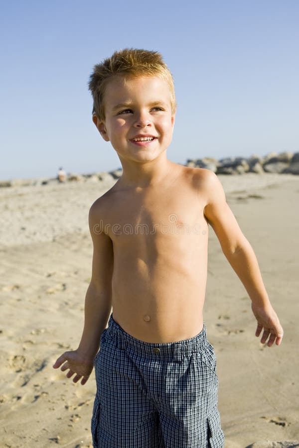 Boy near the water stock photo. Image of playful, cheerful 5623846