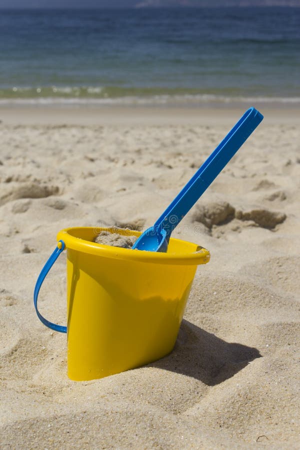 Beach bucket and shovel stock image. Image of ocean, seaside - 31310703