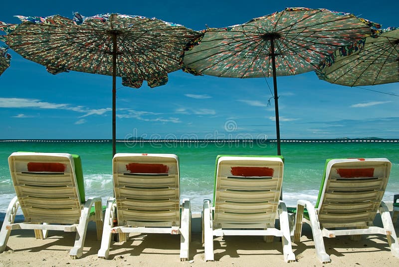 Beach chair and colorful umbrella