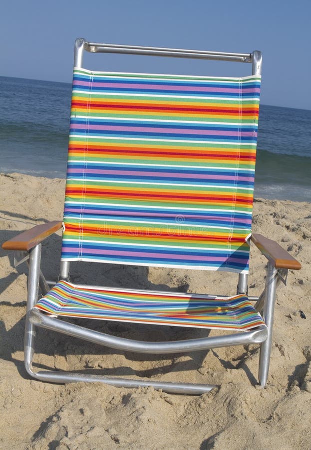 Beach Chair in the Sand stock photo. Image of colored 26004704