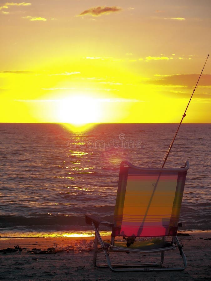 Beach chair at sunset