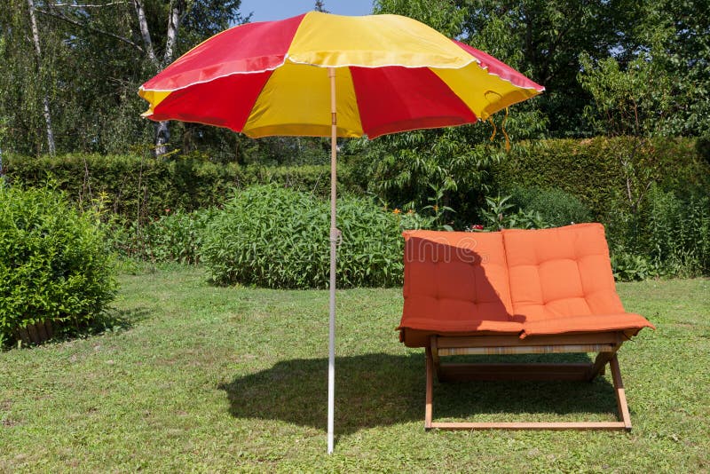 Beach chair with umbrella stock photo. Image of holiday 28213882