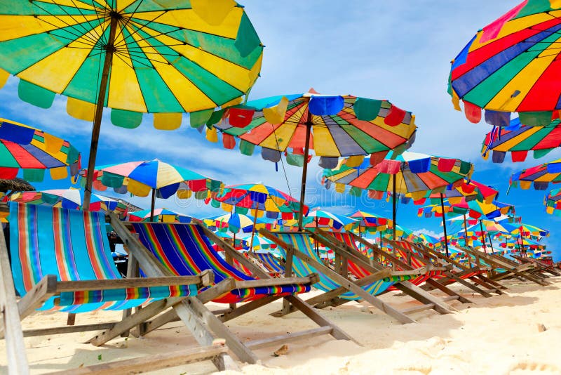 Beach chair and umbrellas on the beach