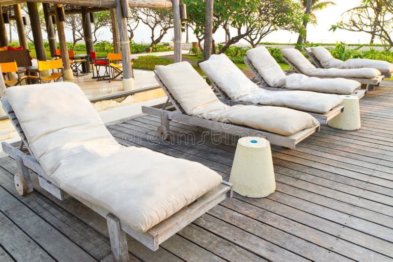 Resort lounge chairs stock image. Image of hotel, lounge 21158927