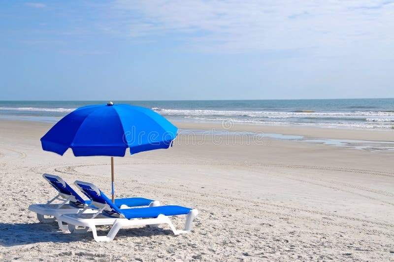 Blue Beach Chairs with Umbrella on Gulf Shores Beach Stock Photo Image of outdoor, seaside
