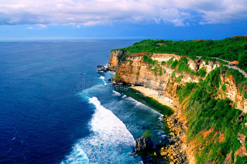 Amazing beach cliff with blue sea taken from Uluwatu, Bali. Amazing beach cliff with blue sea taken from Uluwatu, Bali