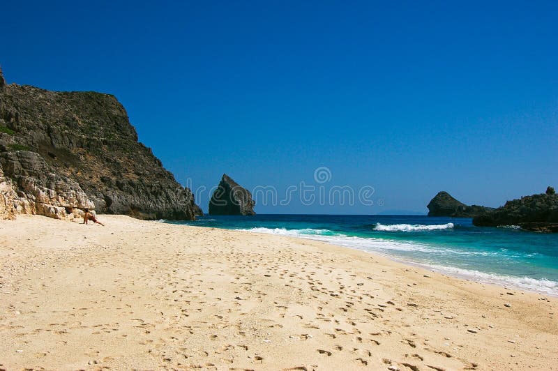 A hidden beach surrounded by the cliff on a southern pacific island of Japan. A hidden beach surrounded by the cliff on a southern pacific island of Japan