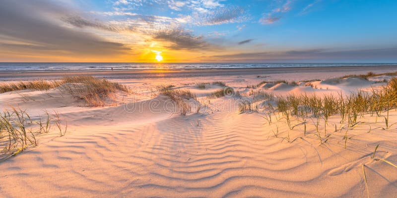 Beach and dunes colorful sunset