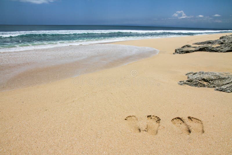 Beach with Footsteps and Stones-Bali,Indonesia