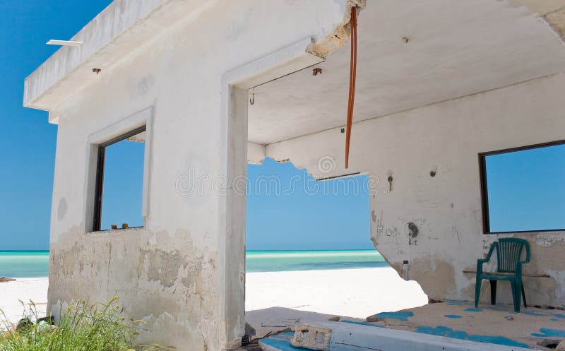 A small beach-front house on the tropical island of Holbox, Mexico, damaged from Hurricane Wilma. Title: Ventanas Al Mar (Windows to the Sea). A small beach-front house on the tropical island of Holbox, Mexico, damaged from Hurricane Wilma. Title: Ventanas Al Mar (Windows to the Sea)