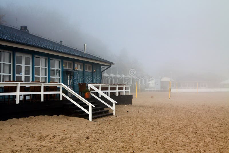 Beach house in fog