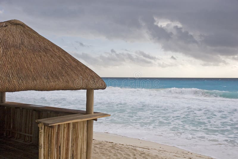 Beach Hut and Stormy Sea