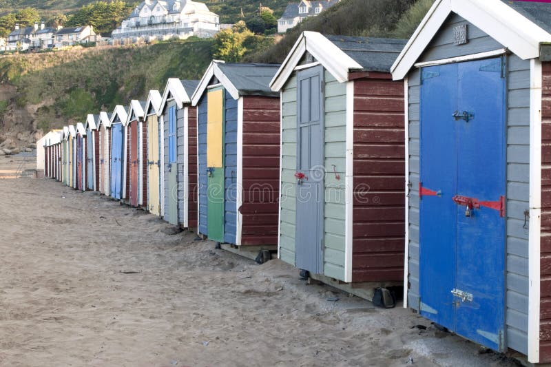 Beach huts early morning Saunton sands stock image