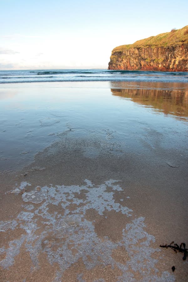 Beach ice and cliffs