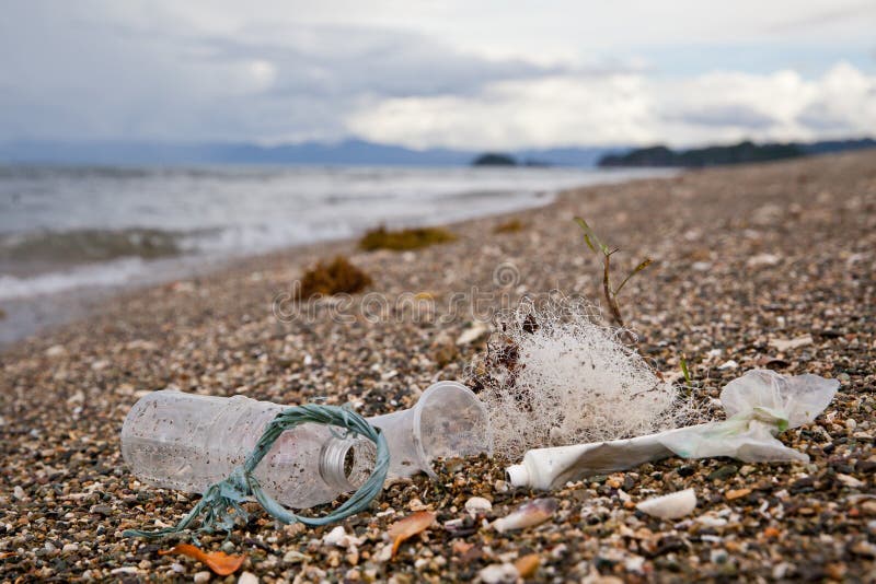 Beach Pollution. Plastic Bottles And Other Trash On Sea Beach Stock
