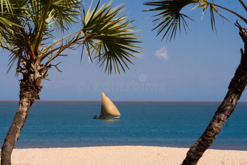 Beach and sailboat