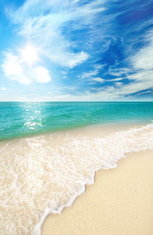 Beach sand and sky with clouds