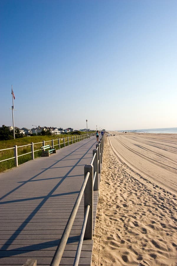Boardwalk along the beach on the New Jersey shore. Boardwalk rail stock images, royalty-free photos and pictures