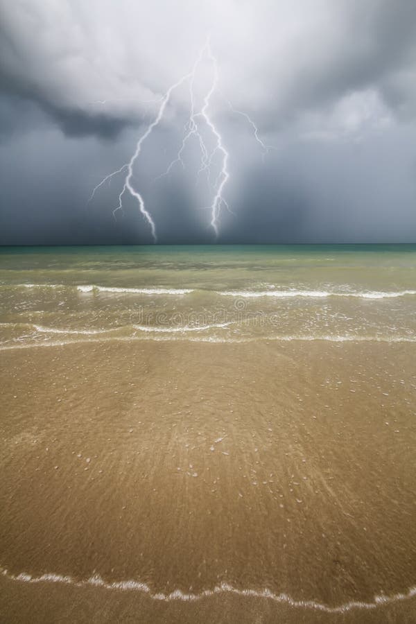Beach, sea and Thunder storm. royalty free stock photography