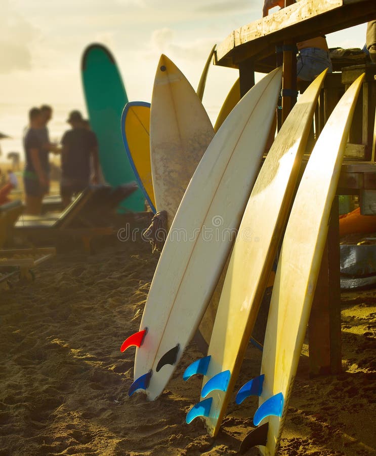 Beach surfers rental surfboards sunset stock photos Beach surfers rental surfboards sunset stock photos