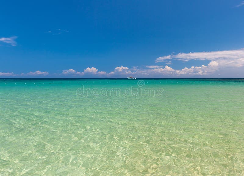 Beach On Tropical Island Clear Blue Water And Sky Stock Image Image