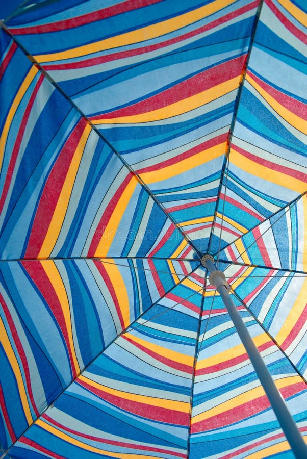 Beach Umbrella stock photo. Image of colours, sunshine 15661004