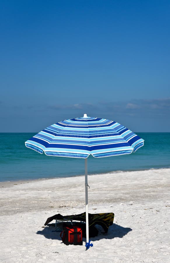 Beach Umbrella and Chair stock image. Image of shore 55694829