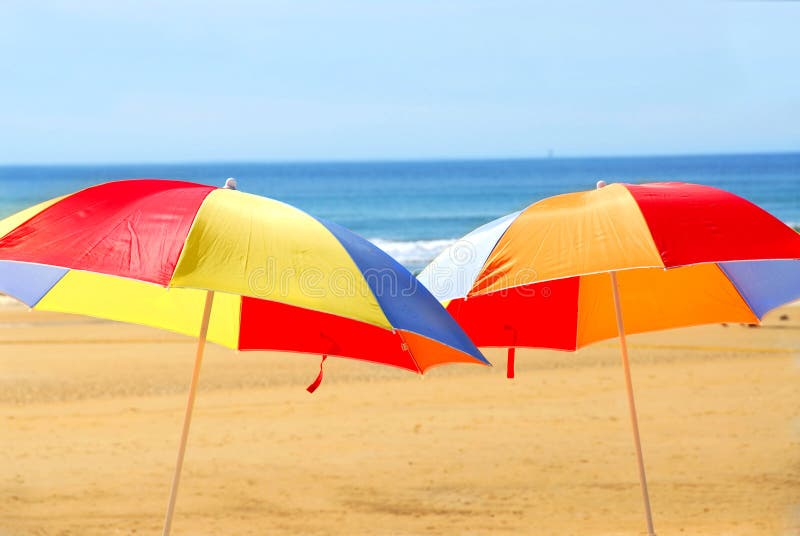 Beach umbrellas stock image. Image of yellow, holiday 1642985
