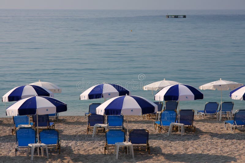 Umbrellas on Sandy Beach stock image. Image of outdoor 51025909