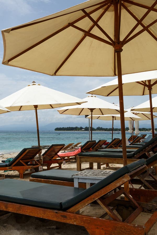Beach umbrellas with sun beds on the beach royalty free stock photos Beach umbrellas with sun beds on the beach royalty free stock photos