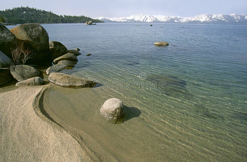 Beach view to the mountains stock image Beach view to the mountains stock image
