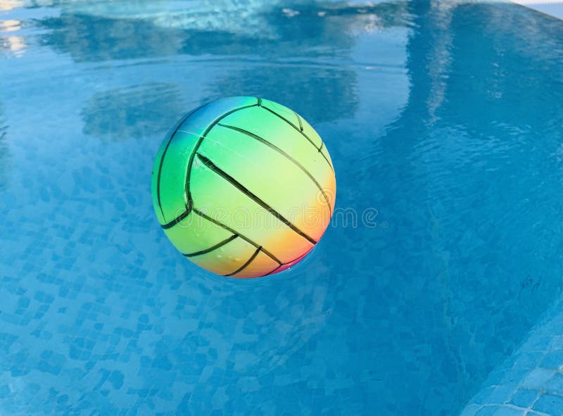 Beach Volleyball Ball Floating in Swimming Pool. Copy Space Stock Photo - Image of summer, game: