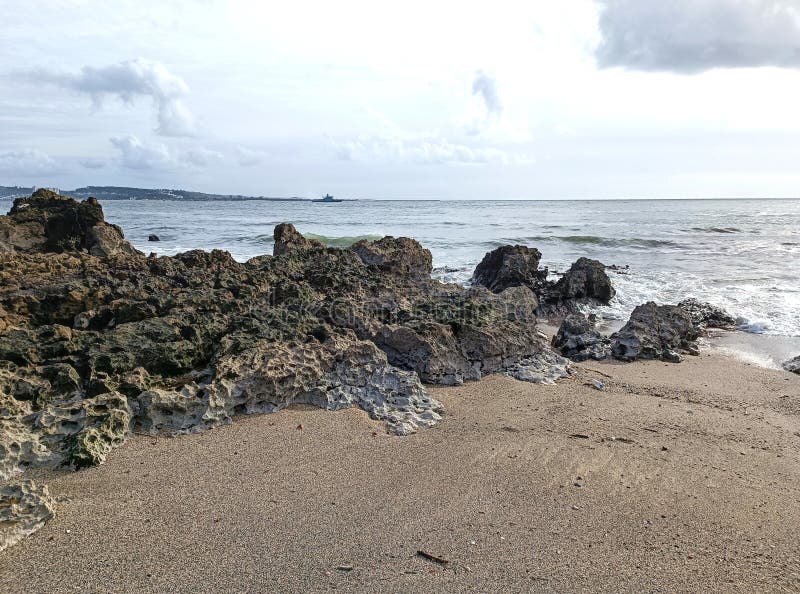 beach wiht rocks and sand in Caxias, Portugal. beach wiht rocks and sand in Caxias, Portugal