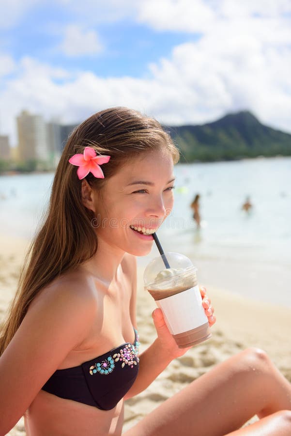 Beach woman drinking iced coffee cappuccino drink royalty free stock images Beach woman drinking iced coffee cappuccino drink royalty free stock images