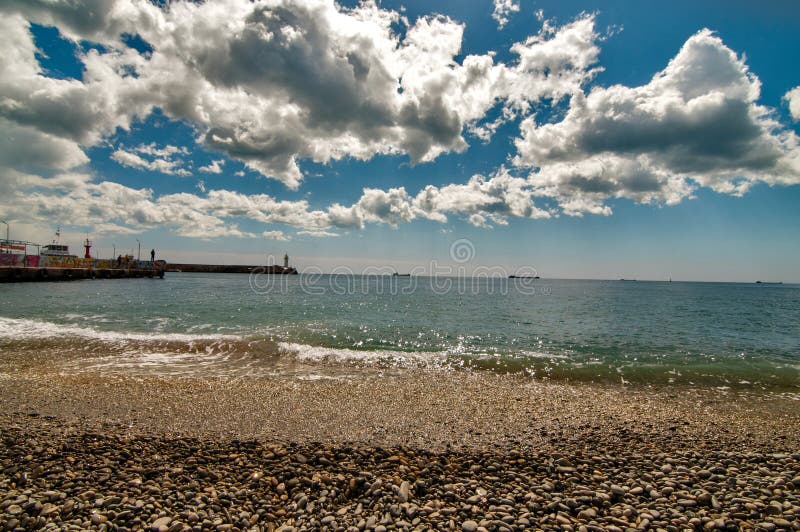 Beach in Yalta editorial stock photo. Image of roofs - 80603188