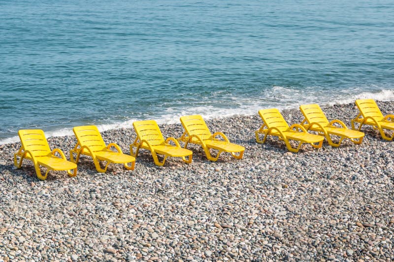 Beach Yellow Chairs or Beds on the Beach Stock Photo Image of seacoast, summertime 78881206