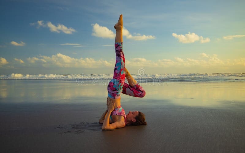 A Woman Practicing A Yoga Pose Standing On One Leg And Arms Lifted Up Stock  Photo, Picture and Royalty Free Image. Image 24691065.