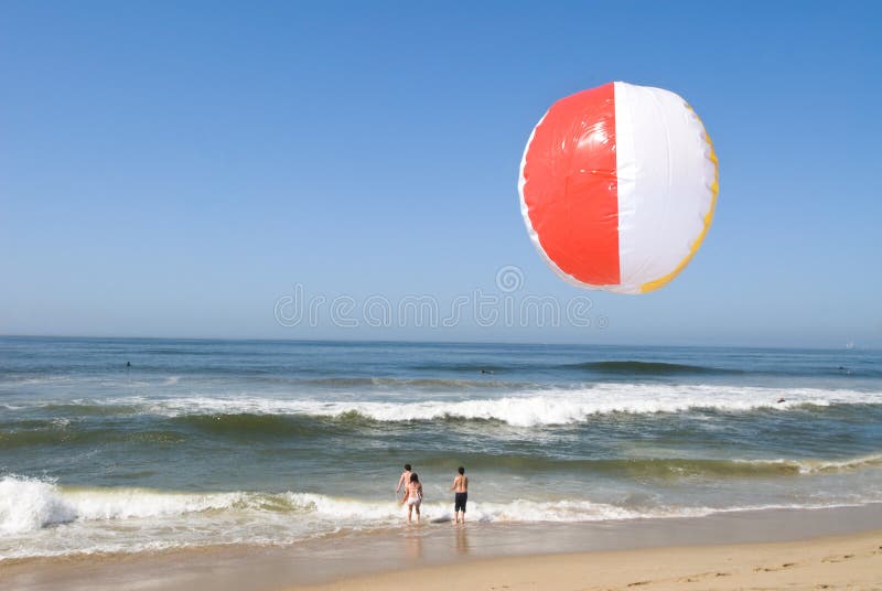 Beach ball in sand stock photo. Image of sand, horizontal 44129784