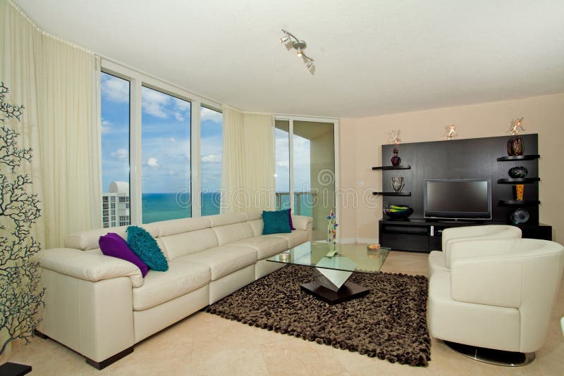 Beachfront living room stock image. Image of table, apartment 27896649
