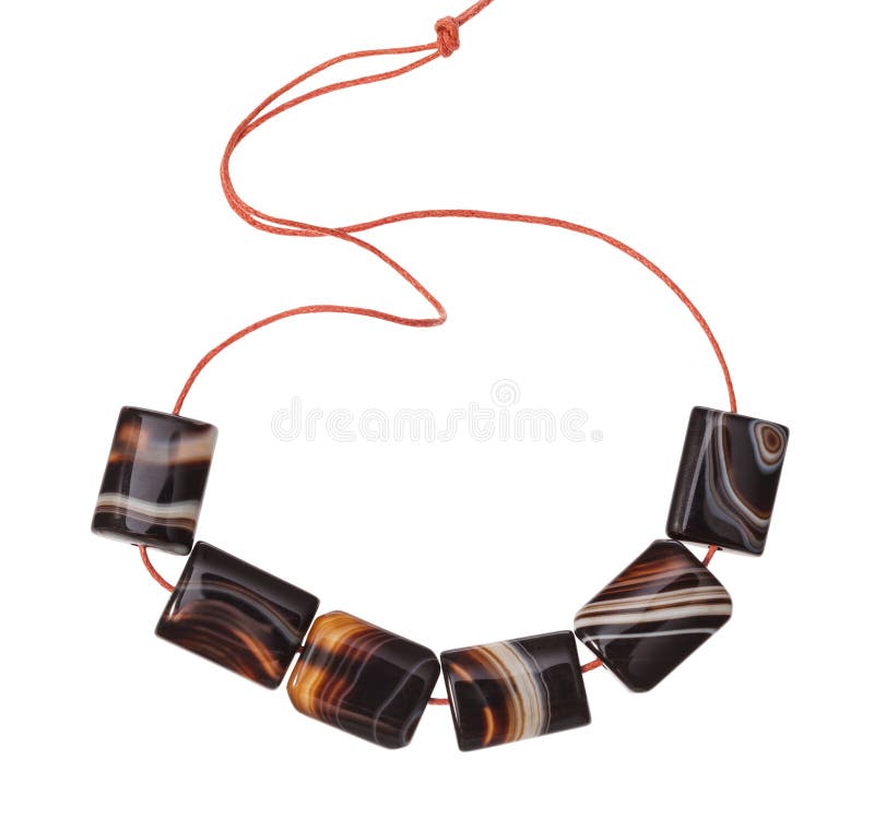 String of beads from natural polished striped agate gemstone isolated on white background