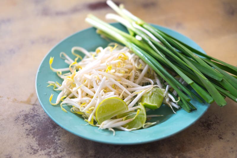 Bean Sprouts and Lemon Eating with Pad Thai Stock Image Image of