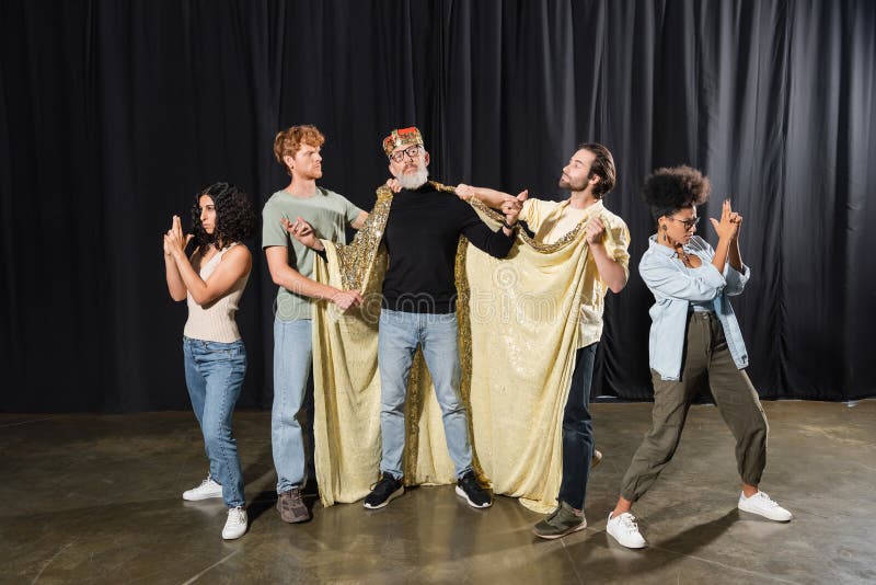Bearded art director standing in costume stock photos