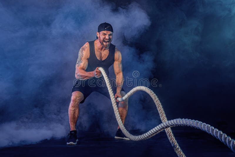 Bearded Athletic Looking Bodybulder Work Out with Battle Rope on