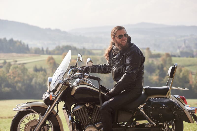 167 Long Hair Guy Motorcycle Stock Photos - Free & Royalty-Free Stock Photos  from Dreamstime