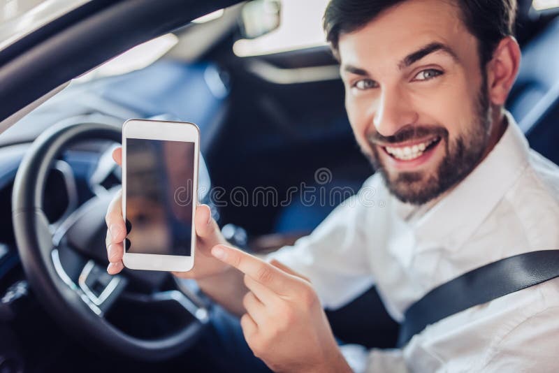 bearded businessman sitting in the car stock image