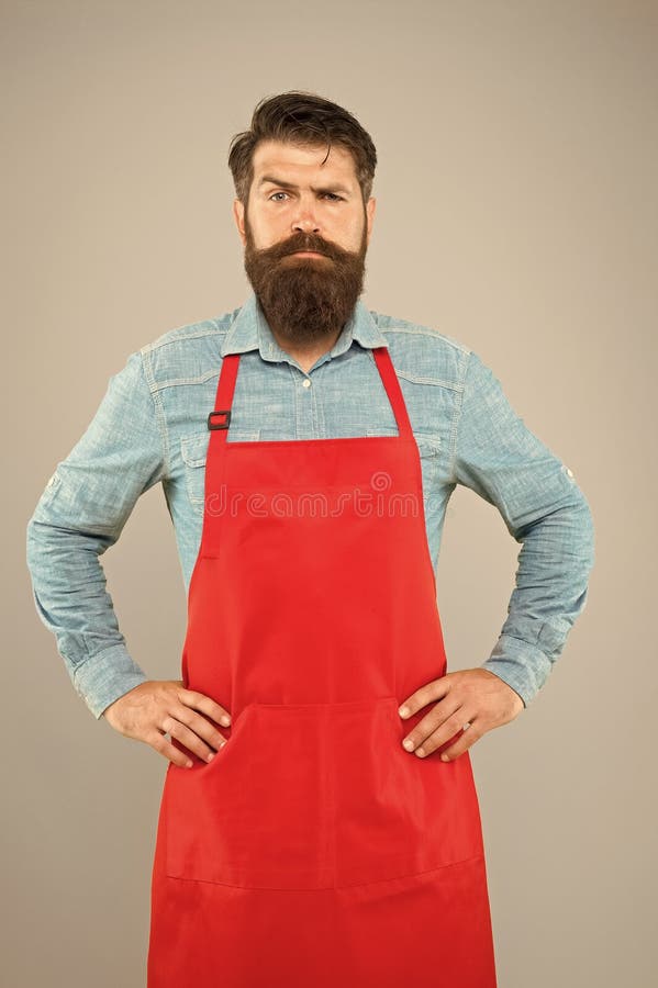 Bearded Chef Or Waiter Wearing Red Apron Brutal Waiter Or Barista Barber Man In An Apron With 