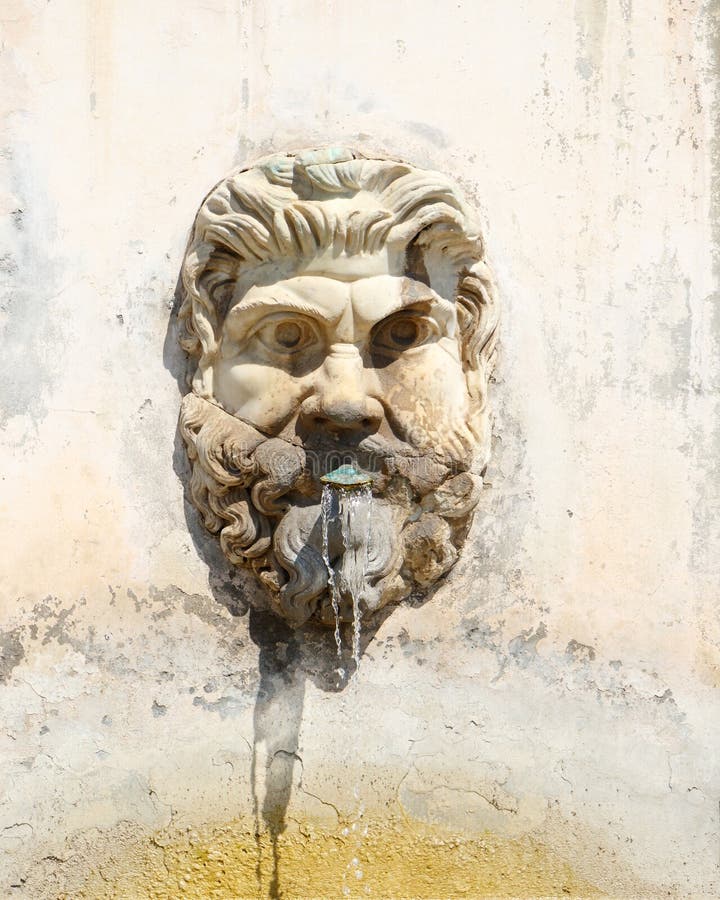 Bearded face as a decorative water faucet