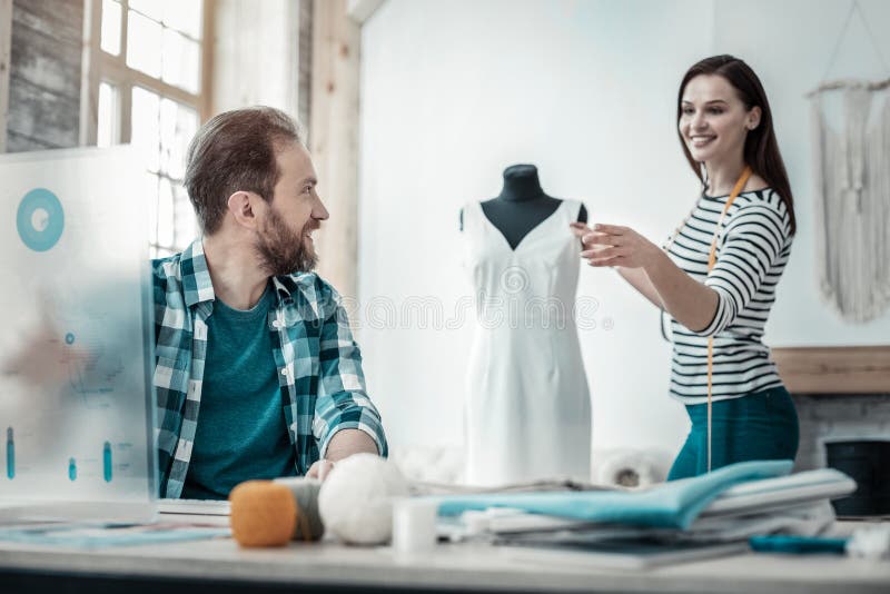Bearded Husband Feeling Proud of His Wife Designing Clothes Stock Image ...