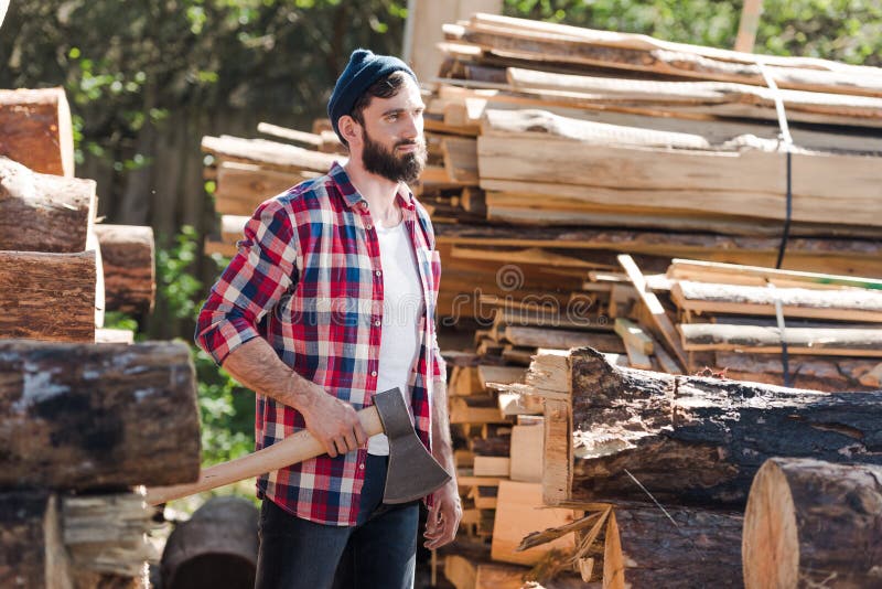 https://thumbs.dreamstime.com/b/bearded-lumberjack-checkered-shirt-standing-axe-sawmill-127734088.jpg